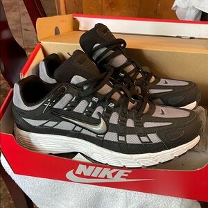 Nike Black and Gray Sneakers 
Never worn